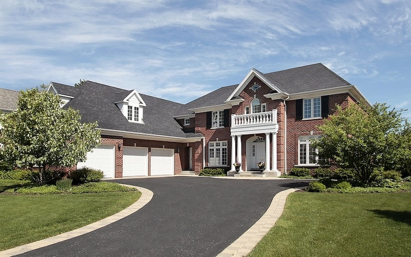 driveway concrete red brick home